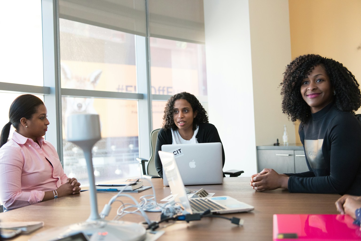 Black business owner planning taxes with an advisor